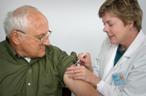 Older man receiving vaccination