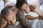 Men couple gay on bed