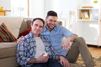 Men couple gay sitting in lounge